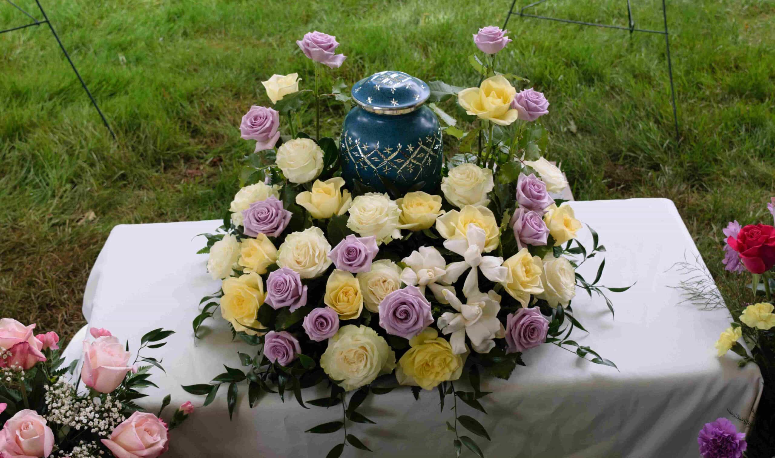 Flowers atop a cremation urn